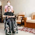 Carer with Wheelchair Client